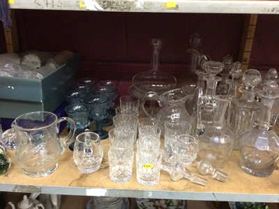 Lot 662 - Two shelves of assorted glassware including decanters, glasses, paperweights and tumblers