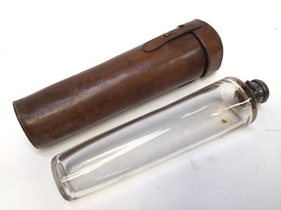 Lot 959 - Edwardian glass saddle flak with silver top in brown leather case (Birmingham 1906), flask 25cm long