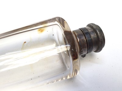 Lot 959 - Edwardian glass saddle flak with silver top in brown leather case (Birmingham 1906), flask 25cm long