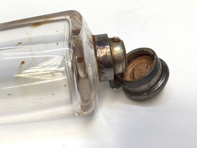 Lot 959 - Edwardian glass saddle flak with silver top in brown leather case (Birmingham 1906), flask 25cm long