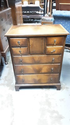 Lot 1161 - Georgian style mahogany chest of four short and three long graduated drawers with central cupboard, 61cm wide, 37.5cm deep, 76cm high