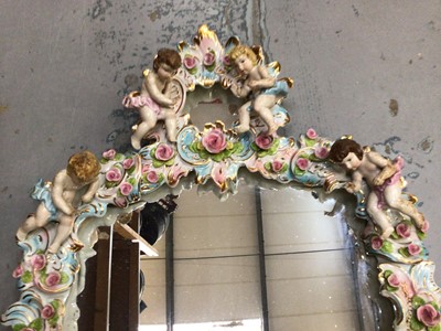 Lot 695 - 18th century style Capodimonte cherub mirror