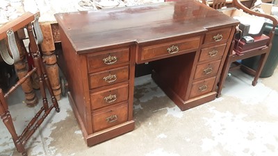 Lot 1171 - Late Victorian walnut kneehole desk with nine drawers and brass handles, 122.5cm wide, 58cm deep, 79cm high