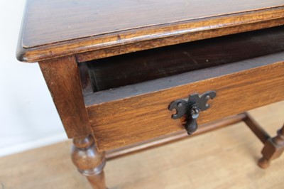 Lot 114 - Edwardian oak side table with single drawer on turned legs joined by stretchers
