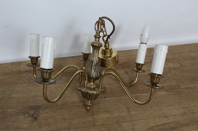 Lot 194 - Antique-style brass hanging electrolier and three matching twin light wall brackets, with shades