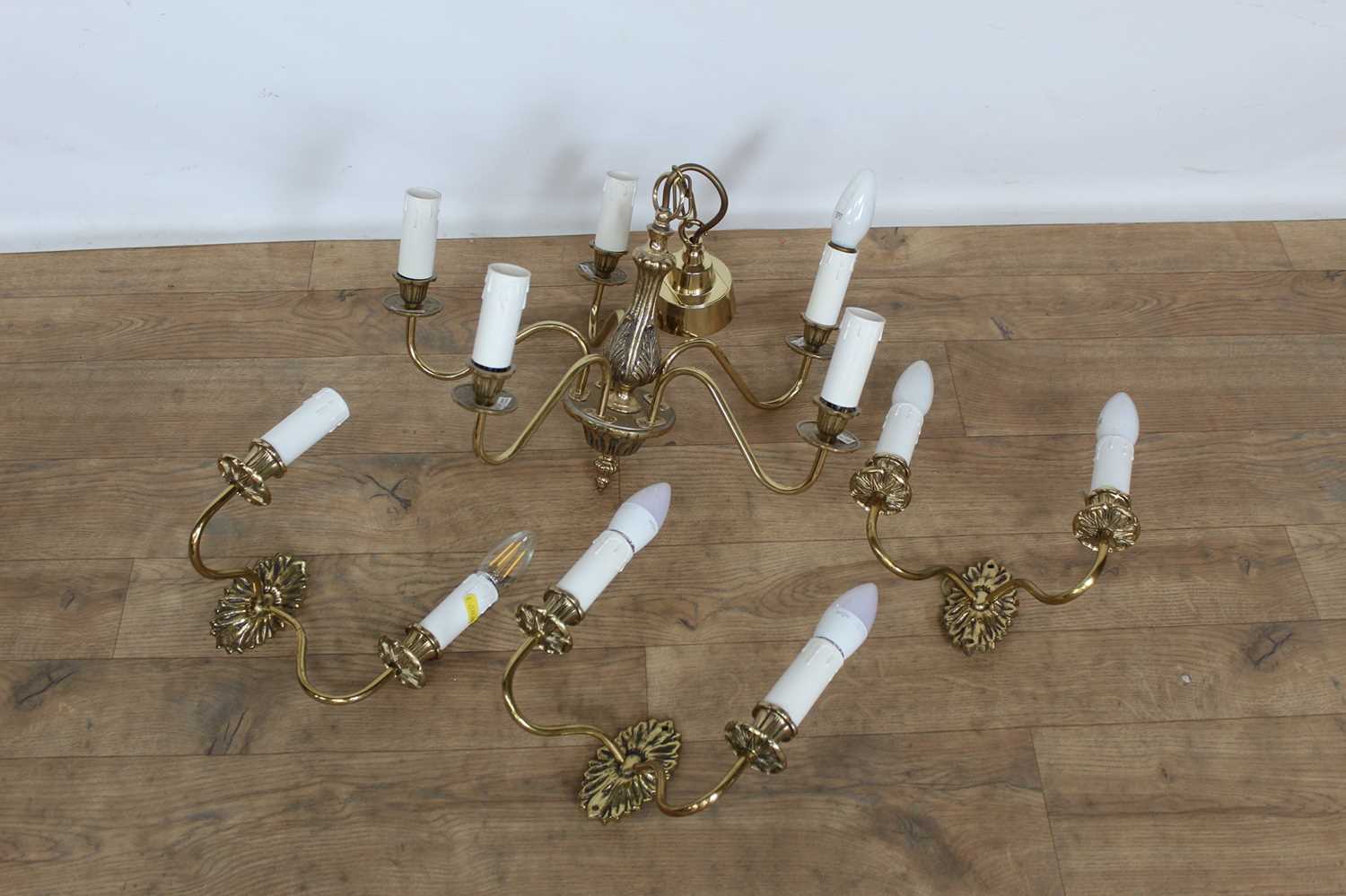 Lot 194 - Antique-style brass hanging electrolier and three matching twin light wall brackets, with shades