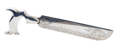 Lot 437 - Unusual Victorian silver plated cake slice in the form of a carpenters' saw with engraved foliate and scroll decoration, 37.5cm in length.