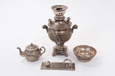 Lot 449 - Middle Eastern white metal samovar with engraved decoration, together with matching cup and teapot and a similar picture frame stand