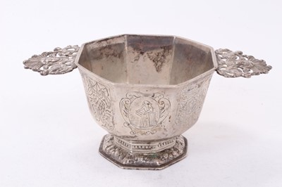 Lot 448 - Antique Dutch white metal two handled bowl of octagonal form, with panels of engraved decoration, on octagonal foot, all at 10ozs, 20cm in diameter.