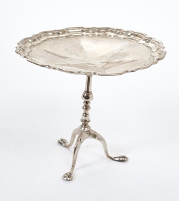 Lot 402 - George V silver miniature model of a pie crust table, (London 1913), maker Goldsmiths & Silversmiths Company Ltd, all at 3ozs, 9.5cm in overall height.