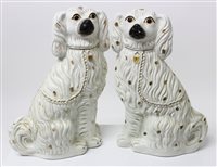 Lot 369 - Pair Victorian Staffordshire white spaniels...