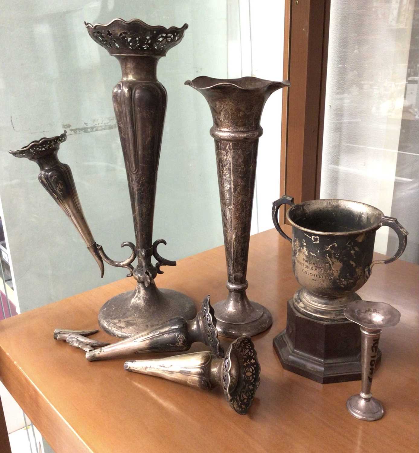 Lot 990 - Silver epergne, silver spill vase, miniature silver spil vase and silver two handled trophy on stand