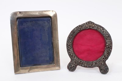 Lot 351 - Late Victorian silver photograph frame of plain form, with rounded top corners and one other