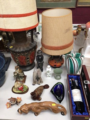 Lot 310 - Two German pottery table lamps with shades, jardinière on stand, two Wedgwood vases, animal ornaments, art glass dish and empty vintage wine bottle