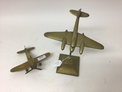 Lot 2446 - Two brass models of aeroplanes