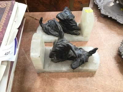 Lot 429 - Pair of book ends in the form of Scottie Dogs on alabaster bases