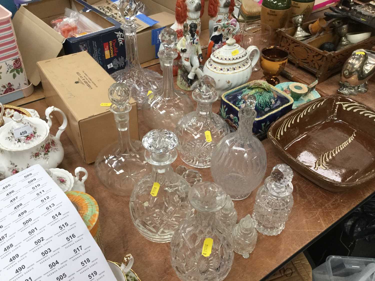 Lot 460 Group of cut glass decanters and stoppers.
