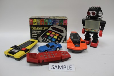 Lot 1825 - Two boxes of vintage electronic toys and games