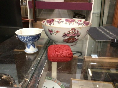 Lot 268 - 19th century Chinese blue and white stem cup, together with an 18th century famille rose bowl, and a cinnabar lacquer box (3)