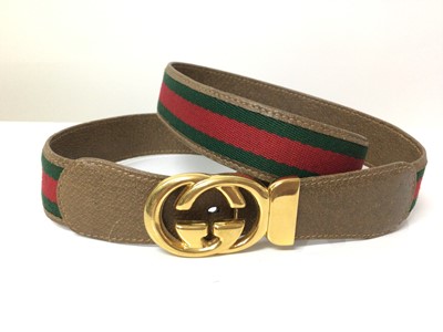 Lot 2074 - Gucci green and red canvas brown leather belt with gilt metal GG buckle