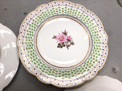 Lot 361 - Pair of Royal Copenhagen plates painting with flowers and two 19th century cabinet plates, one painted with an exotic bird (4)