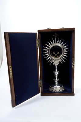 Lot 240 - 18th / 19th century Continental silver monstrance of typical sun burst form, raised on knopped column support with acanthus leaf and beaded