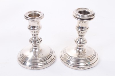 Lot 237 - Pair of Contemporary silver candlesticks, (Birmingham 1966), together with a continental silver two handled cup and cover marked 800