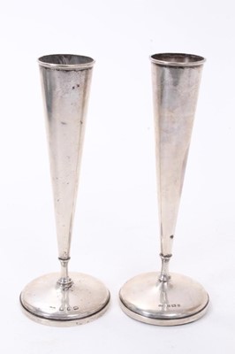 Lot 237 - Pair of Contemporary silver candlesticks, (Birmingham 1966), together with a continental silver two handled cup and cover marked 800