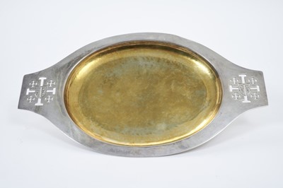 Lot 230 - Fine George V silver communion dish of oval form with overall planished decoration, central gilded bowl and pierced side handles depicting the Jerusalem cross