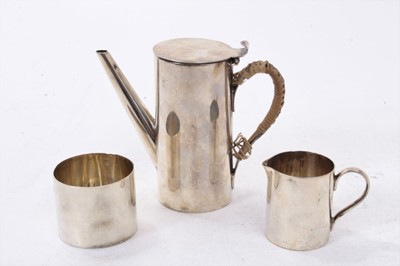 Lot 396 - Edwardian silver bachelors' coffee set, comprising coffee pot of cylindrical form with angular spout, flush fitting hinged cover and wicker