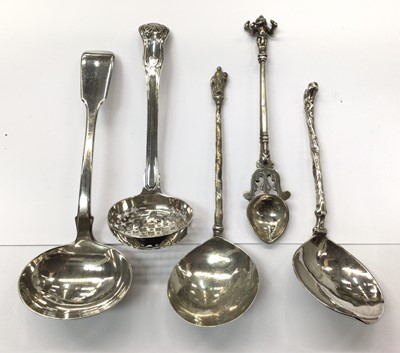 Lot 937 - Victorian silver fiddle pattern ladle, silver sifter ladle, two Dutch silver spoons and an Eastern white metal spoon (5)