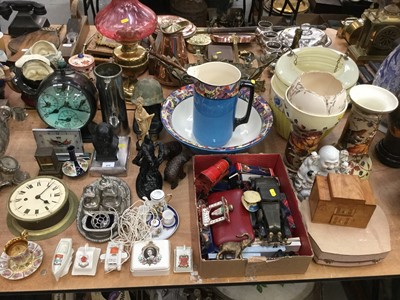 Lot 478 - Collection of sundry items to include clocks, wash jug and bowl, souvenir spoons, shell case and other items.