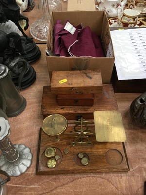 Lot 482 - Early 20th century oak and brass letter scales, together with weights and a group of silver plated cutlery.