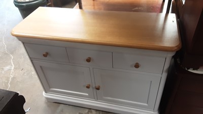 Lot 1246 - Contemporary light oak and painted sideboard with three drawers and two panelled doors below, 119cm wide, 45cm deep, 85cm high