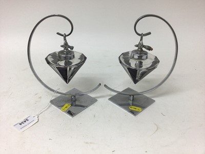 Lot 2434 - Pair of 1930s glass scent bottles suspended on chromium plated stands