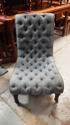 Lot 1266 - Victorian nursing chair with buttoned blue upholstery on reeded turned