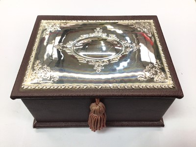 Lot 257 - Silver topped maroon leather jewellery box
