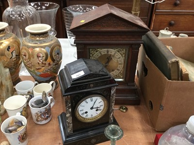 Lot 503 - Edwardian oak cased mantel clock together with a black slate mantel clock (2)