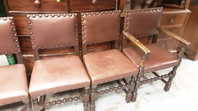 Lot 1272 - Set of six oak dining chairs with studded decoration on bobbin turned and block legs joined by stretchers, comprising four standards and two carvers