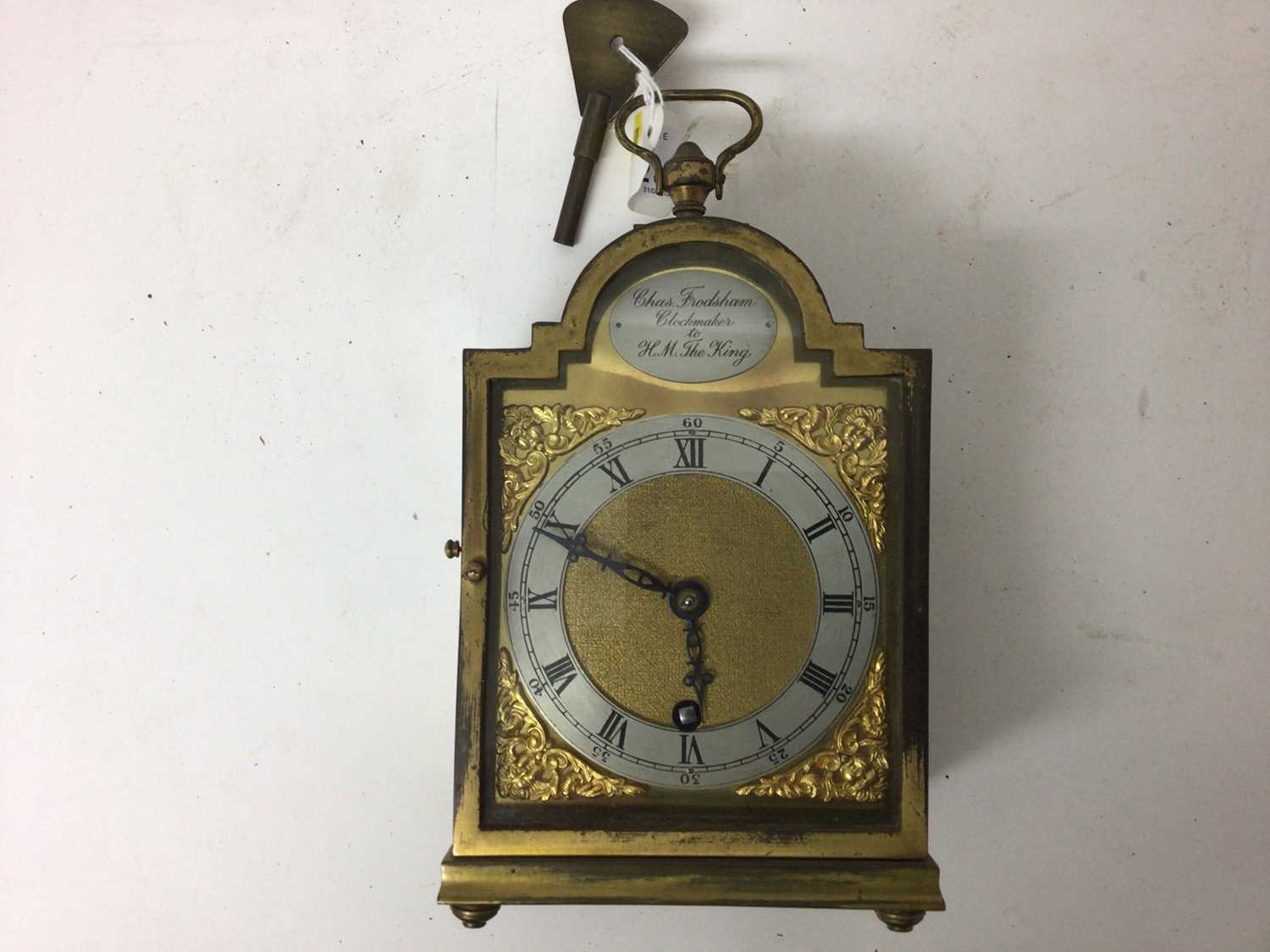 Lot 2422 - Charles Frodsham mantel clock in brass case with original key