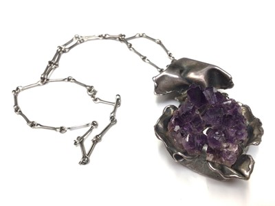 Lot 3 - Abstract silver and raw amethyst pendant on chain