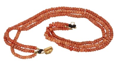 Lot 464 - Antique coral bead three stand necklace with gold clasp stamped 585