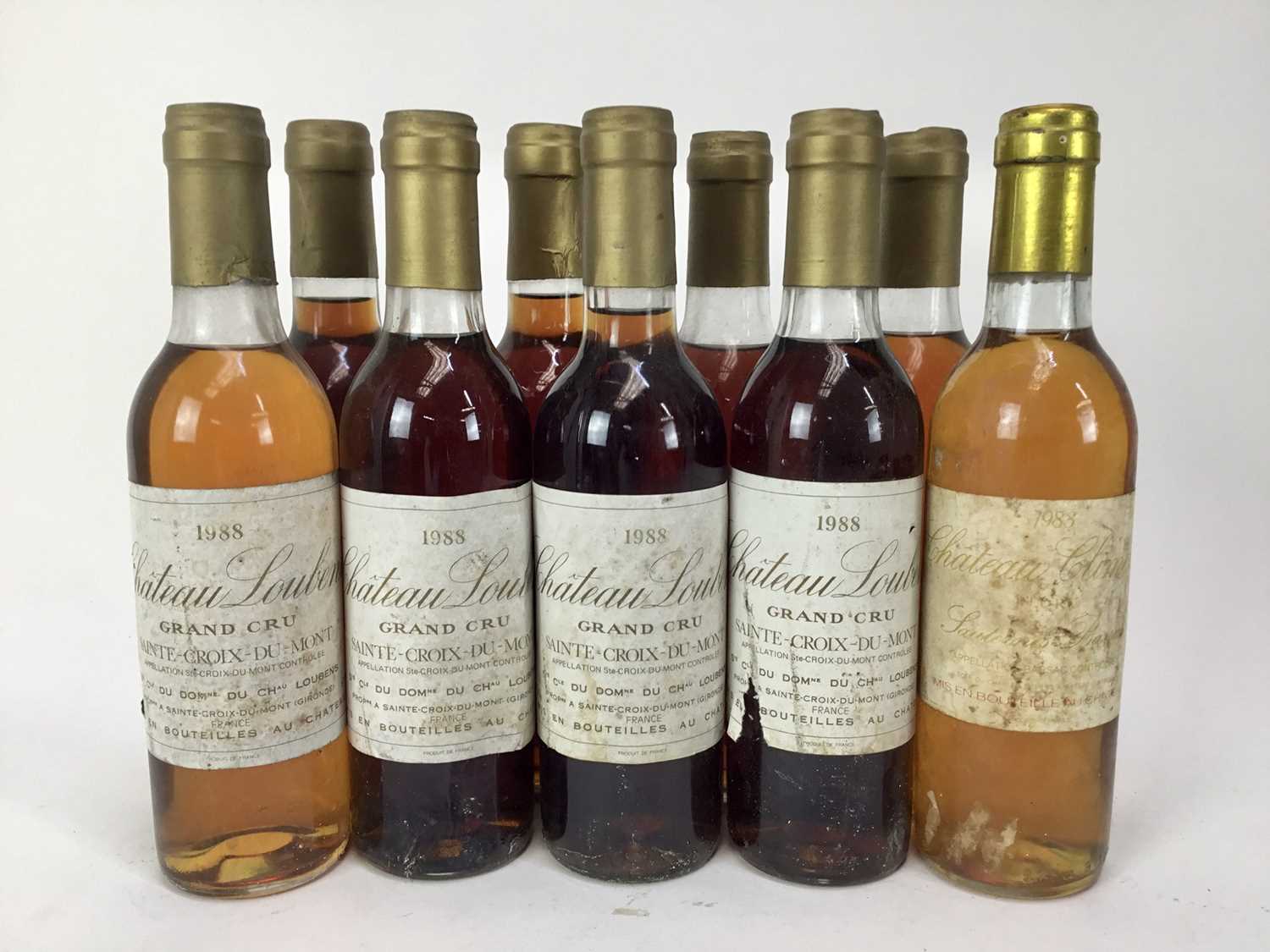 Lot 101 - Wine - eight half bottles, Chateau Loubens Grand Cru 1988 (four lacking labels), together with a bottle of Chateau Climens 1983 (9)