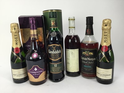 Lot 102 - Six bottles - Moët & Chandon two half bottles, Courvoisier V.S.O.P, Glenfiddich 12 year old whisky, Hampton Court Elderberry wine and Captain Morgan rum