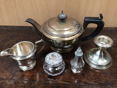 Lot 981 - Silver tea pot, silver cream jug, small silver candlestick, silver caster and silver topped glass jar