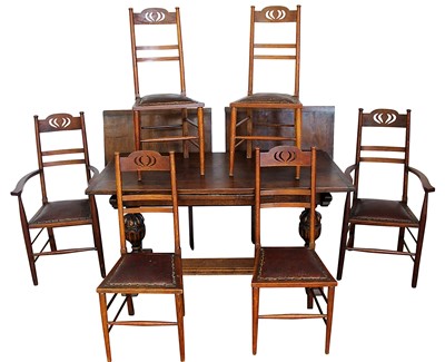 Lot 1328 - Small oak refectory table retailed by Libertys and set of six arts and create dining chairs