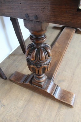 Lot 1328 - Small oak refectory table retailed by Libertys and set of six arts and create dining chairs
