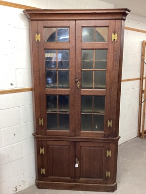 Lot 1350 - Georgian oak two height standing corner cupboard