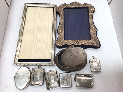 Lot 992 - Two silver photograph frames, silver snuff box and group of plated vesta cases