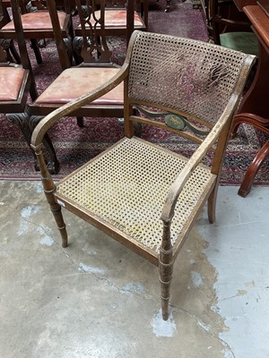 Lot 144 - Regency style bergere open elbow chair with painted decoration